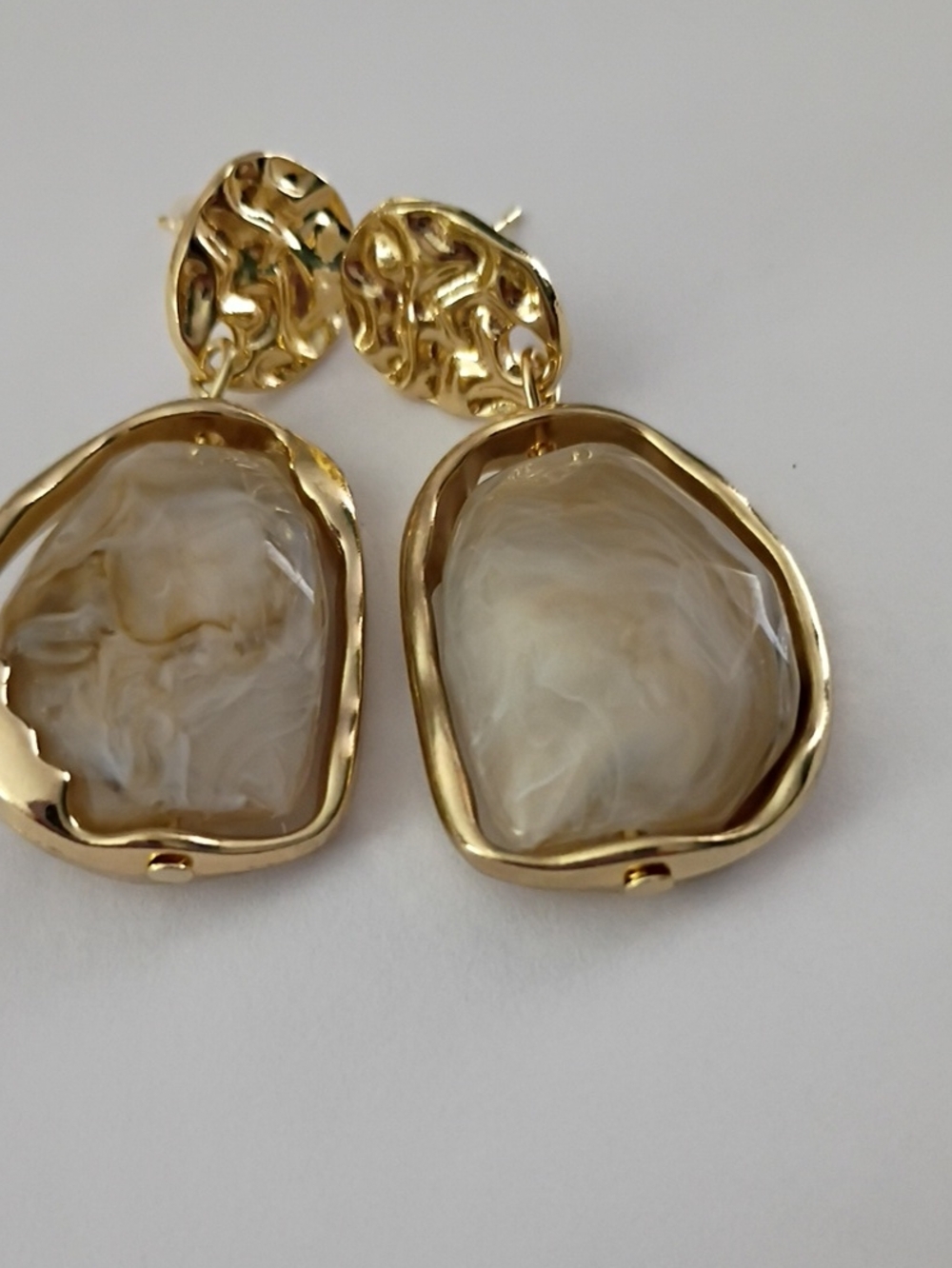 Gold-Tone Drop Earrings with Cream Marbled Center